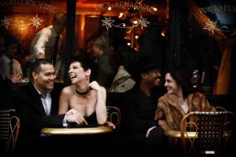 Dinner and laughter at a Paris cafÃ©.